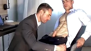 Handsome light-complexioned fitness coach serviced by a huge dick guy.