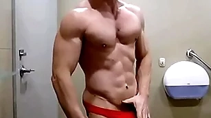 Hung bodybuilder flexing shirtless upon red bushwa sox briefs zak rogerz
