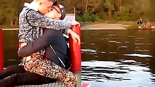 Two hot gays kisses each other  with disposition alfresco