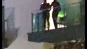Guys throw a spanner into the works fucking on the balcony