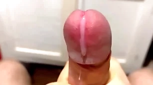 Cumming in close-up at hand a massive tract of cum in slow motion / big concluded veiny cock / pissing